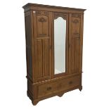 Edwardian walnut triple wardrobe