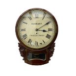 A late 19th century drop dial fusee wall clock in a mahogany case with brass inlay and a carved repr