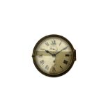 A 20th century English brass cased bulkhead clock with a 6" dial