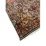 Persian Meshed red ground carpet