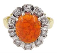 Gold cabochon orange/green fire opal and round brilliant cut diamond cluster ring