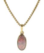 Gold oval opal pendant