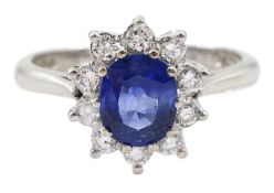 18ct white gold oval sapphire and round brilliant cut diamond cluster ring by Boodles