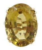 Gold single stone oval citrine ring