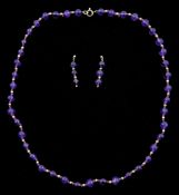 Amethyst and 9ct gold bead necklace and a pair of 9ct gold matching stud pendant earrings
