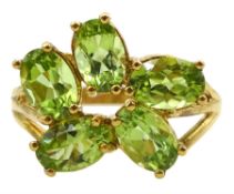 Silver-gilt five stone peridot cluster ring