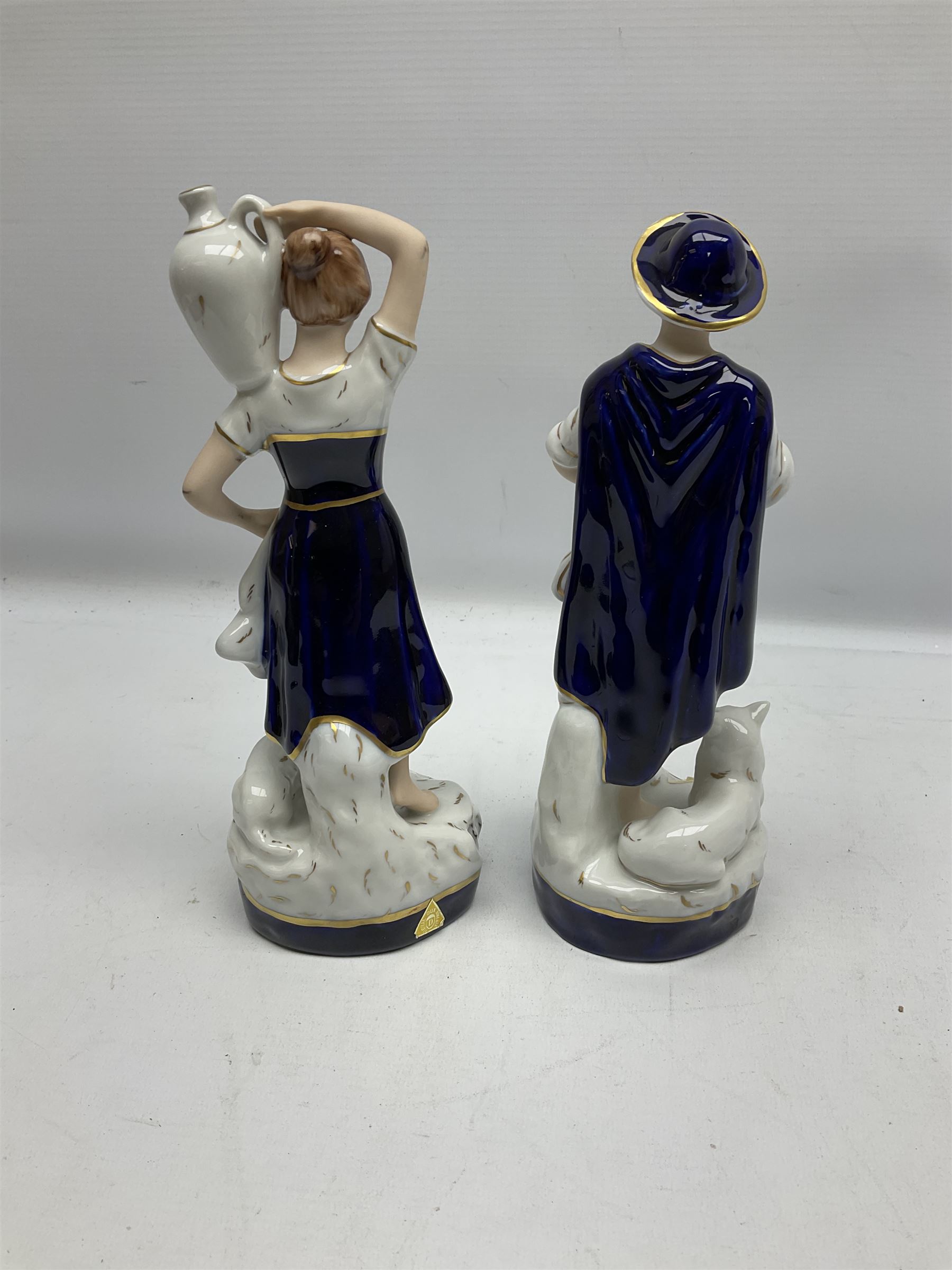 Pair of Royal Dux figures to include Shepherdess carrying a water jug with a recumbent lamb beside h - Image 2 of 3
