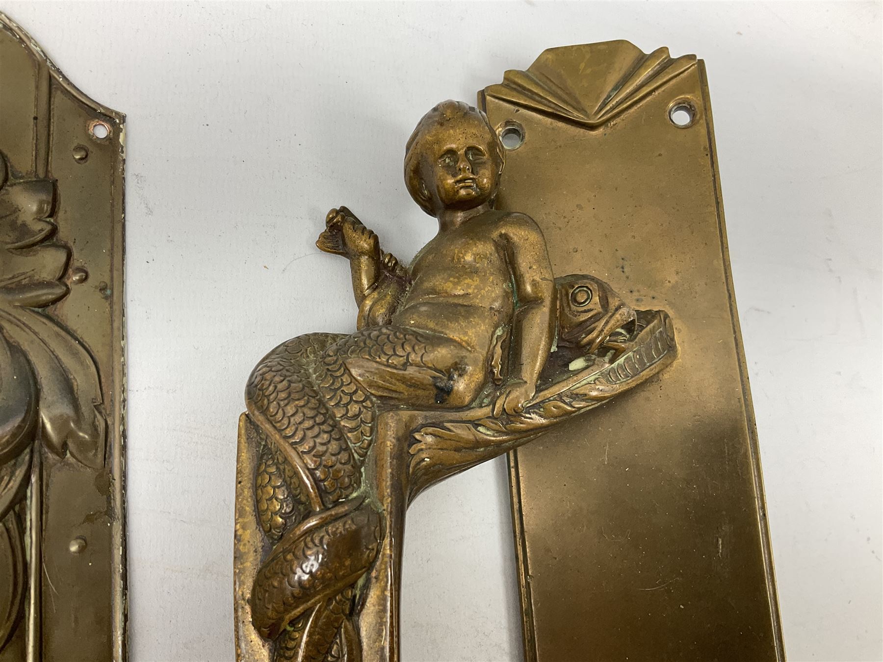 Art Nouveau bronze door handle modelled with a young merman holding a stylised fish - Image 2 of 4