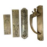 Art Nouveau bronze door handle modelled with a young merman holding a stylised fish