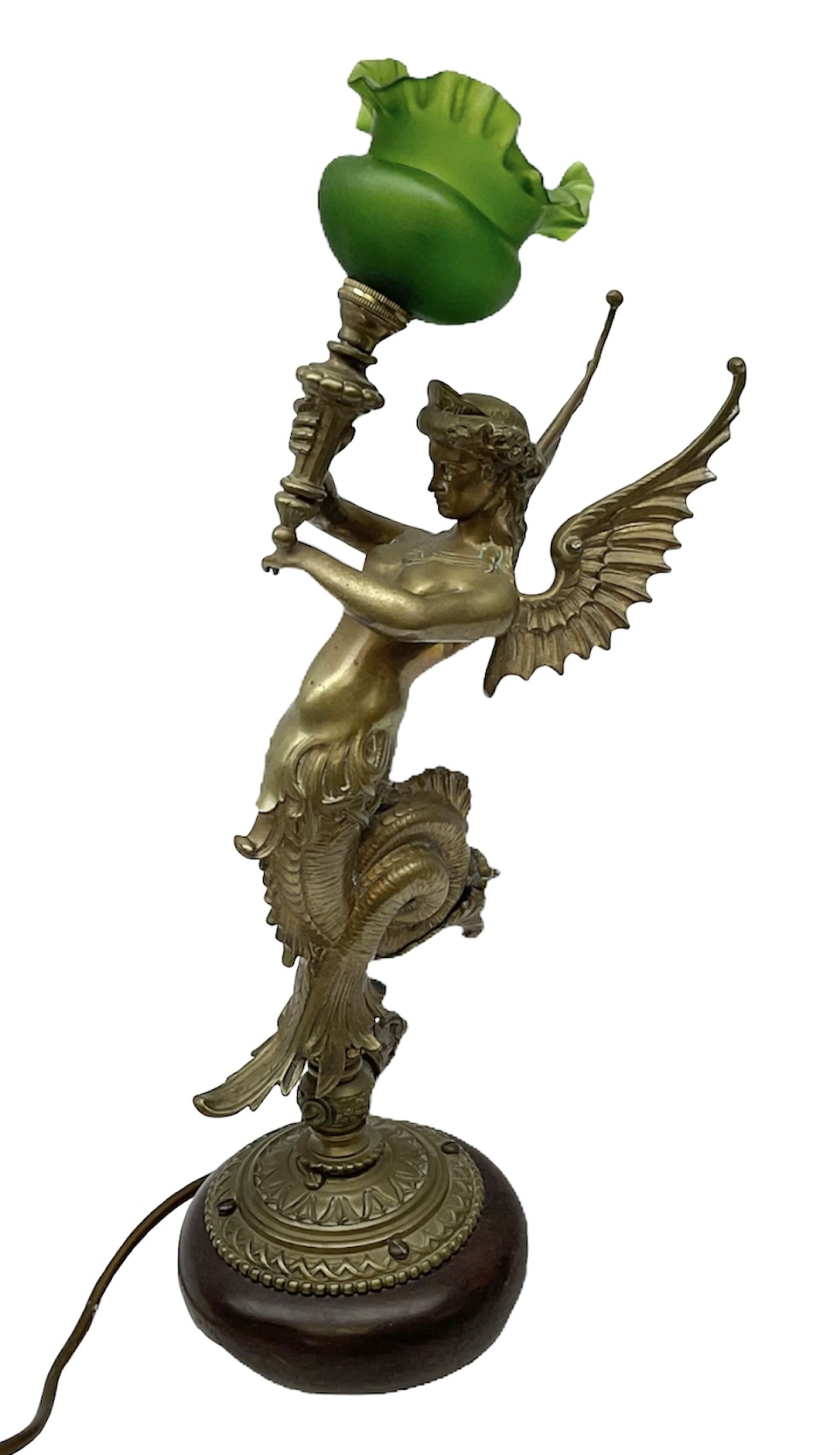 Victorian gilt bronze converted gas lamp in the form of mythical winged mermaid upon a circular oak