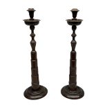 Pair of turned wooden candlesticks