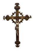 Oak crucifix carved with flowers