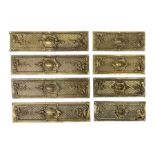 Two sets of four brass Art Nouveau finger plates