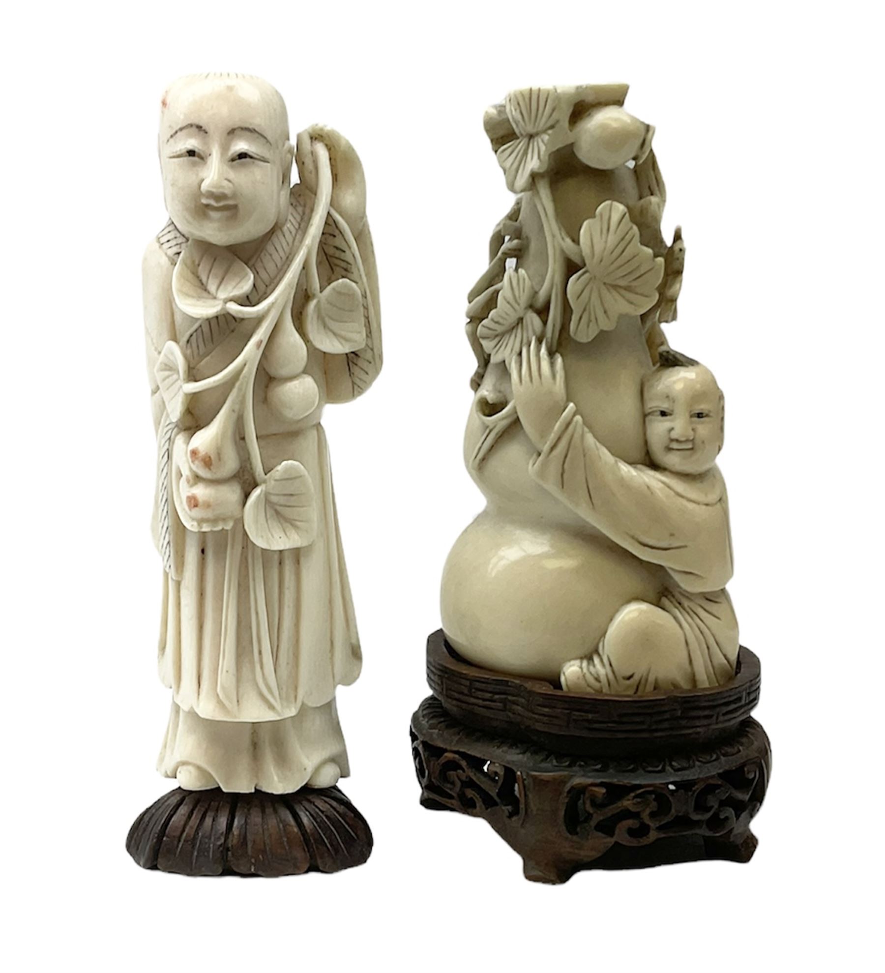 Two carved ivory figures