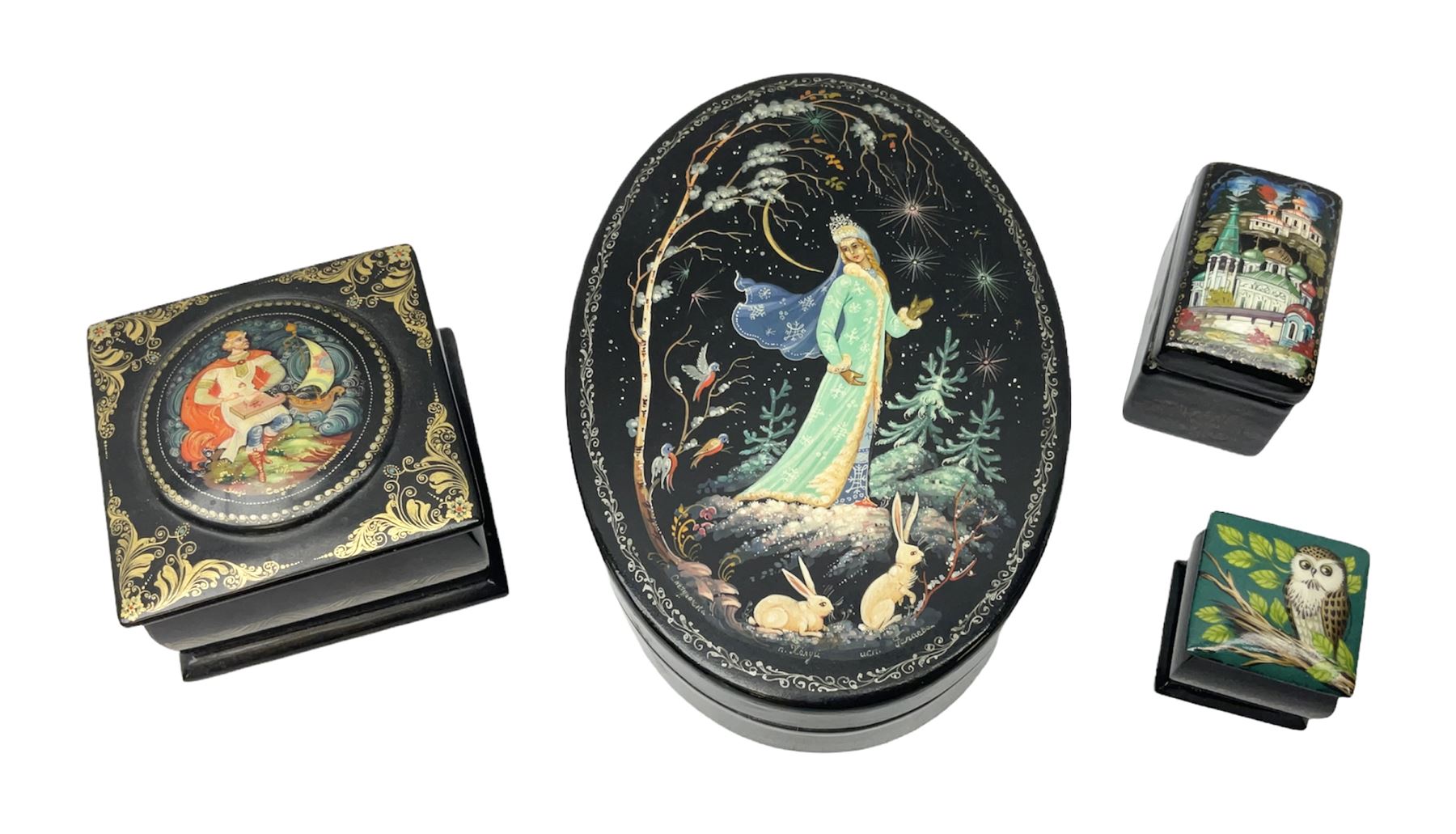 Four 20th century Russian lacquered and hand painted boxes