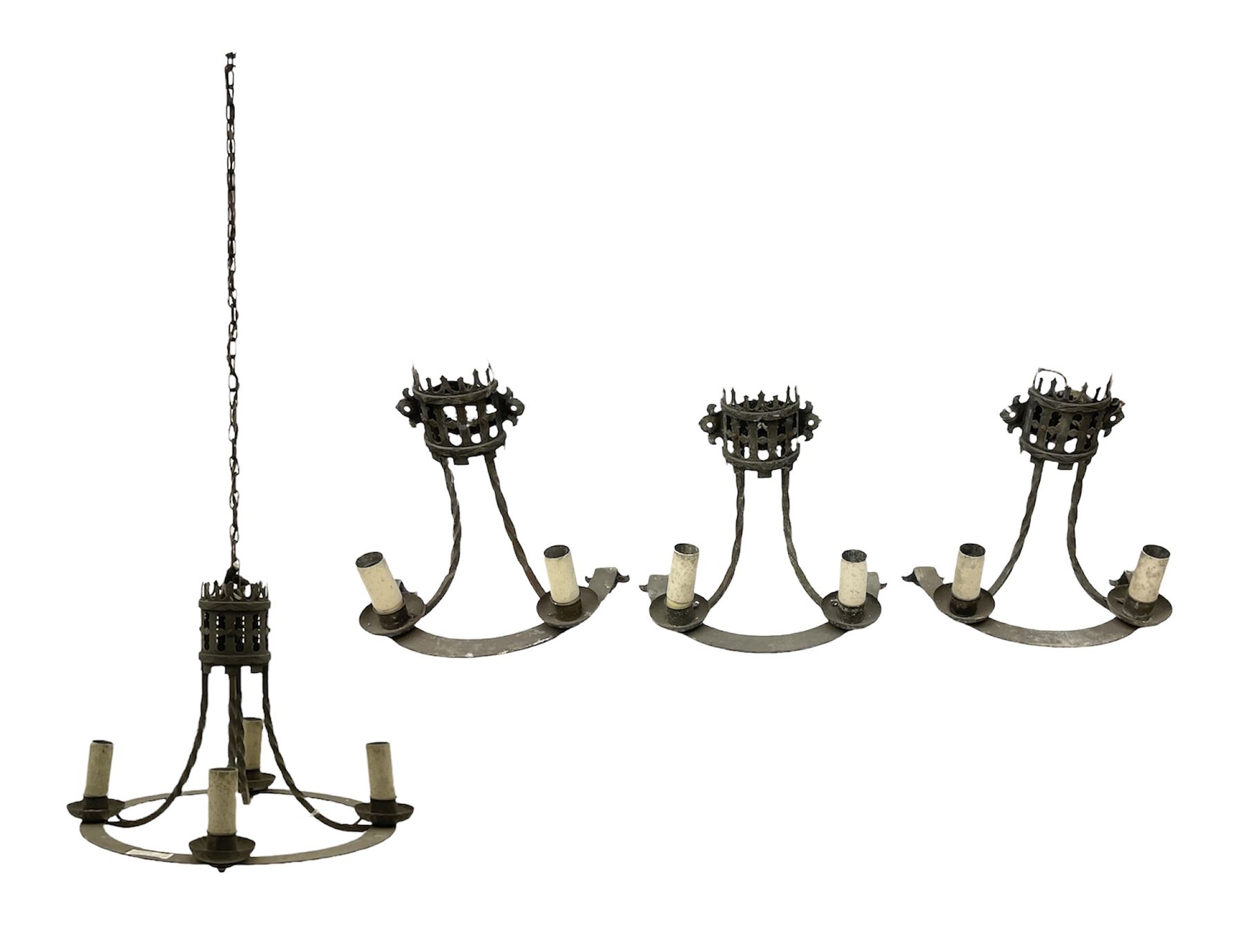 Gothic style iron chandelier with drip pans and twisted branches together with three matching twin w