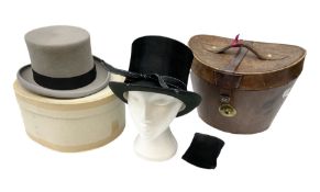 Leather hat box containing black felt top hat with 'British Manufacture' label