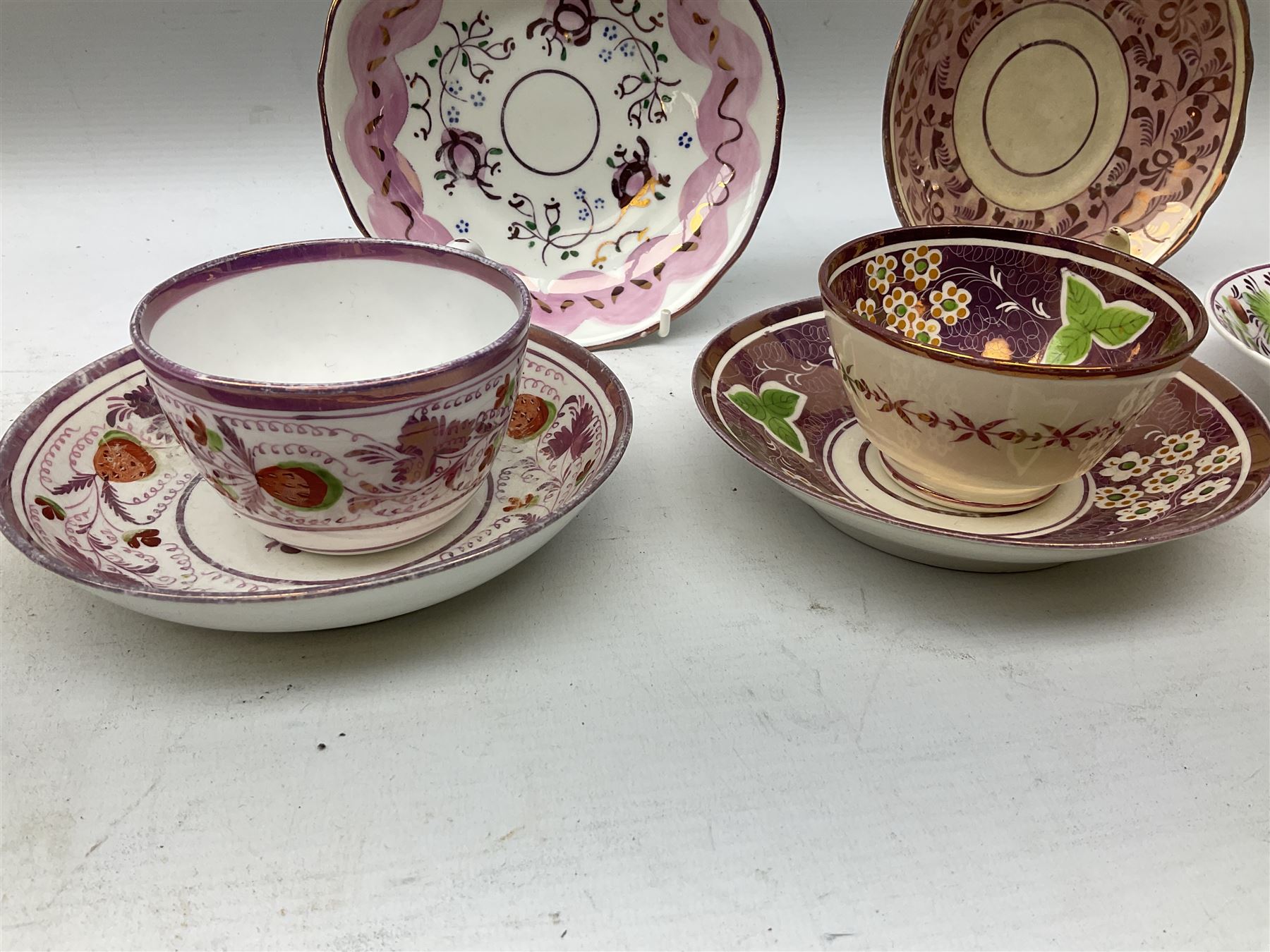 Three 19th century porcelain pink lustre teacups - Image 4 of 4