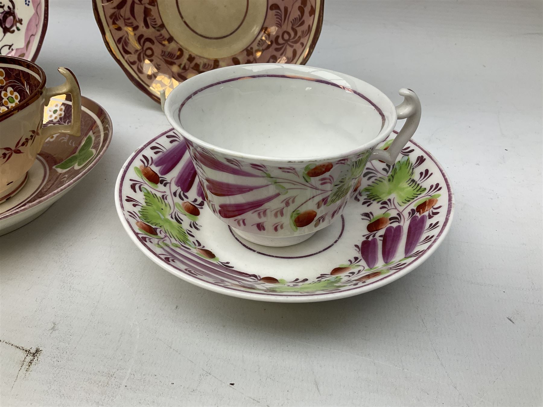 Three 19th century porcelain pink lustre teacups - Image 2 of 4