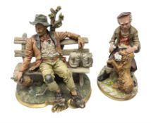 Two 20th Century Capodimonte tramp figures to include example seated on a bench beside bag on gilt l