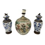 Pair of early 20th century Chinese crackle glaze vases of baluster form decorated with birds and blo
