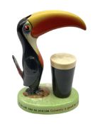 Carltonware Guinness advertising table lamp (lacking fitting) in the form of a toucan with a glass o
