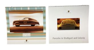 Two Porsche calendars comprising the years 2000 and 2001