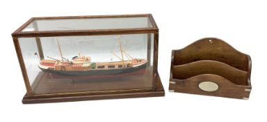 Model ship in glazed case together with a wood letter rack