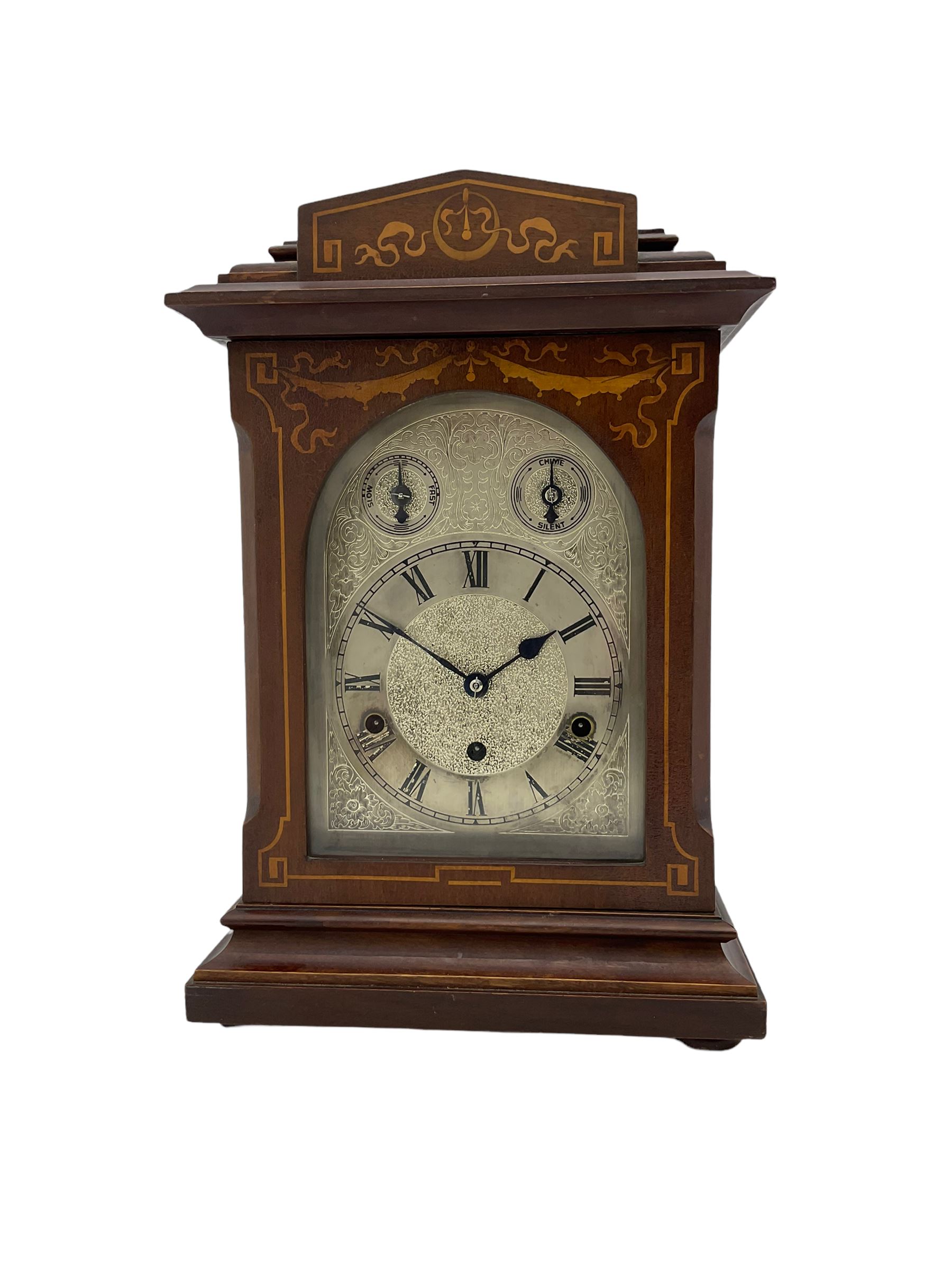 An Edwardian c1905 Westminster chiming mantle clock in a mahogany Sheraton style case with inlay an