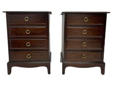 Stag - pair of Minstrel range mahogany four drawer pedestal chests