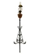 Late 19th century black painted wrought metal standard lamp