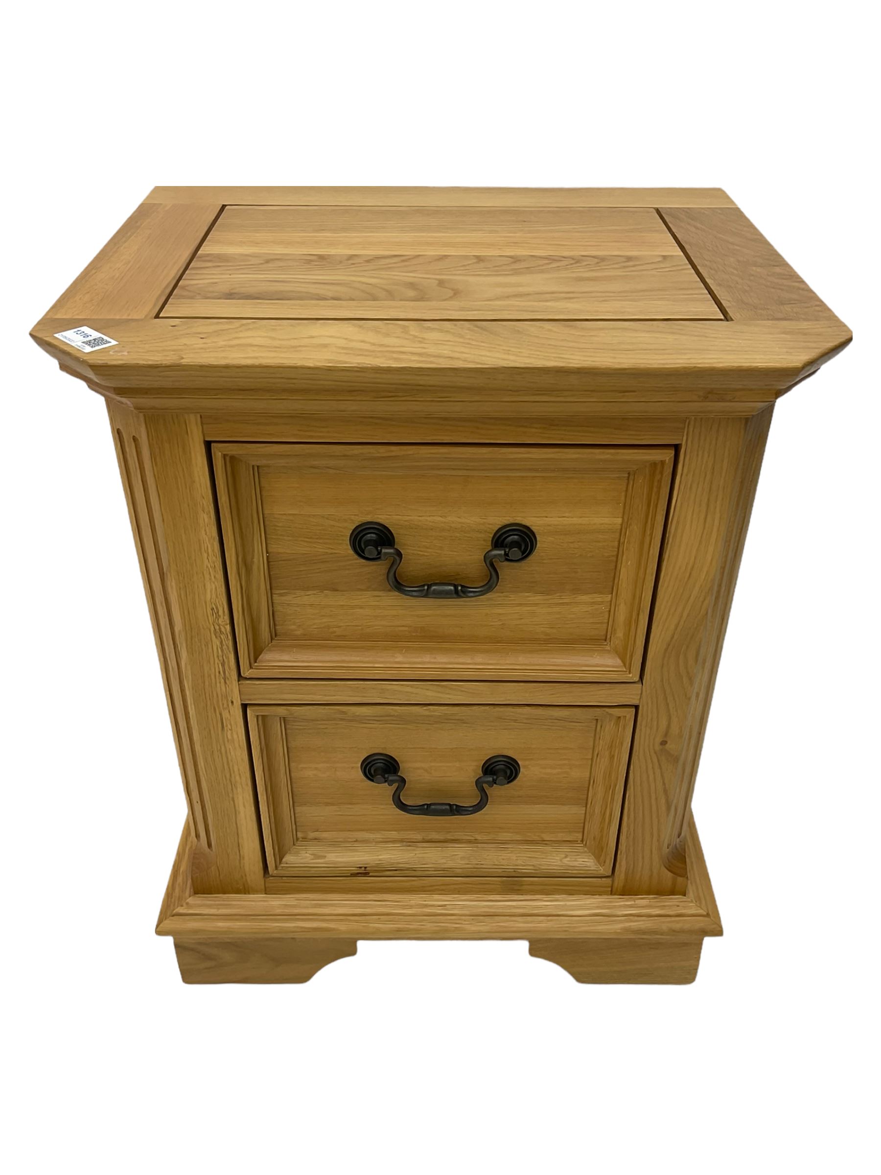 Small light oak two drawer pedestal chest