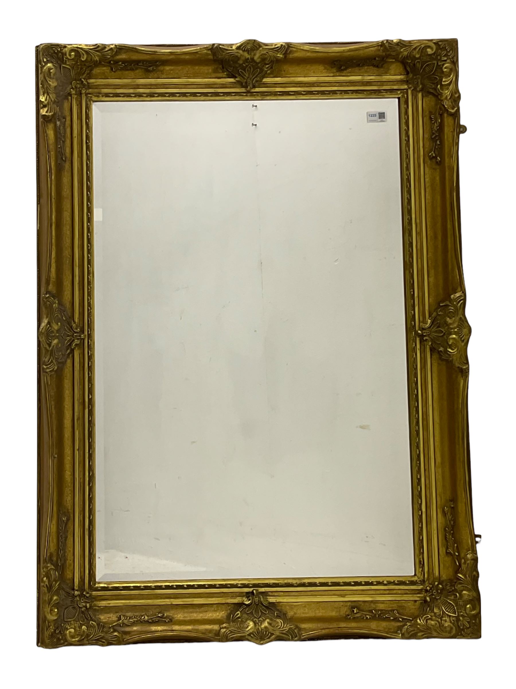 Rectangular wall mirror in gilt swept frame