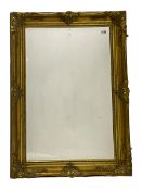 Rectangular wall mirror in gilt swept frame