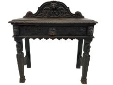 Victorian heavily carved oak side table