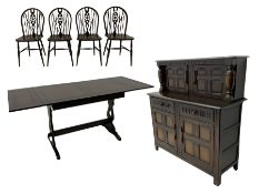 Dark oak drawer leaf dining table with four hoop and wheel back chairs; and similar court cupboard