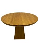 Light oak circular dining table