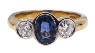 9ct gold three stone oval sapphire and round brilliant cut diamond ring