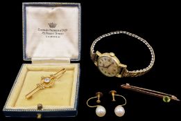 Edwardian gold aquamarine and split pearl brooch