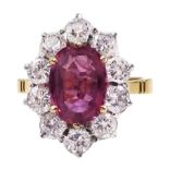 18ct gold oval pink sapphire and round brilliant cut diamond cluster ring