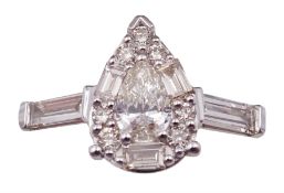 White gold pear shaped diamond cluster ring