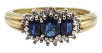 9ct gold three stone oval sapphire and round brilliant cut diamond cluster ring