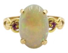 18ct gold three stone oval opal and ruby ring
