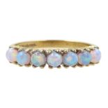 Silver-gilt seven stone opal ring