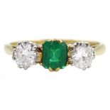 Early 20th century gold three stone old cut diamond and emerald ring