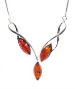 Silver three stone marquise amber necklace