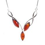 Silver three stone marquise amber necklace