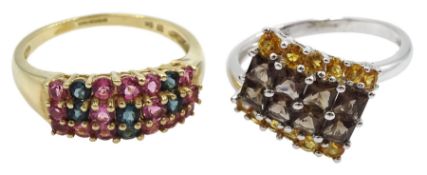 Gold pink and London blue topaz three row ring and a white gold citrine and smoky quartz dress ring