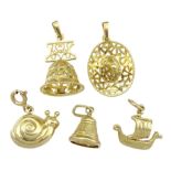 Five gold charms including snail