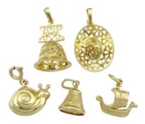 Five gold charms including snail